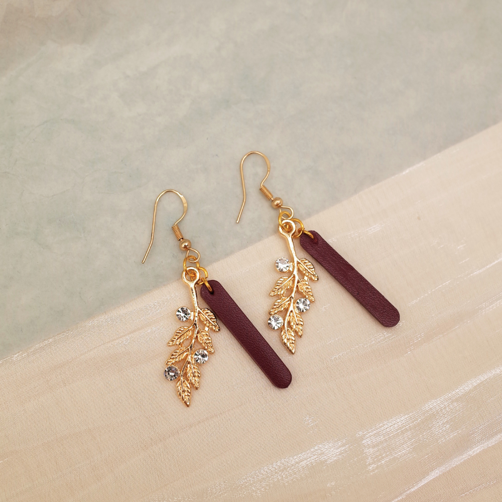 Leafy Gold Accent Leather Earrings