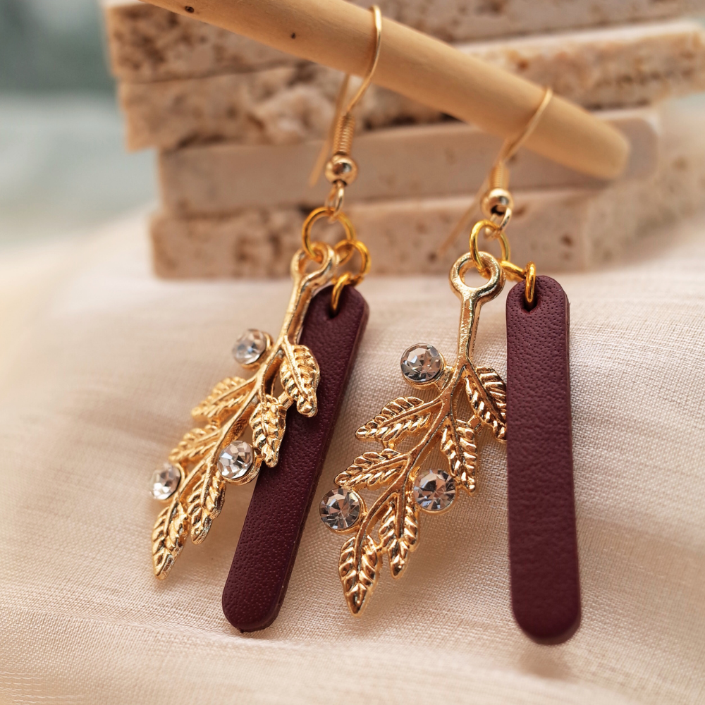 Leafy Gold Accent Leather Earrings