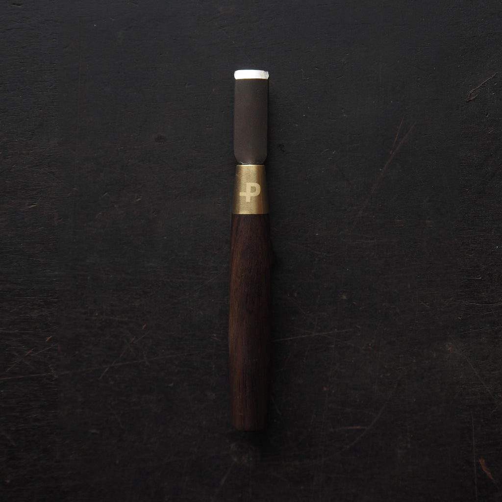 CPT Corner Punch Tool – Full Set - close-up of a professional corner punch with wooden handle.