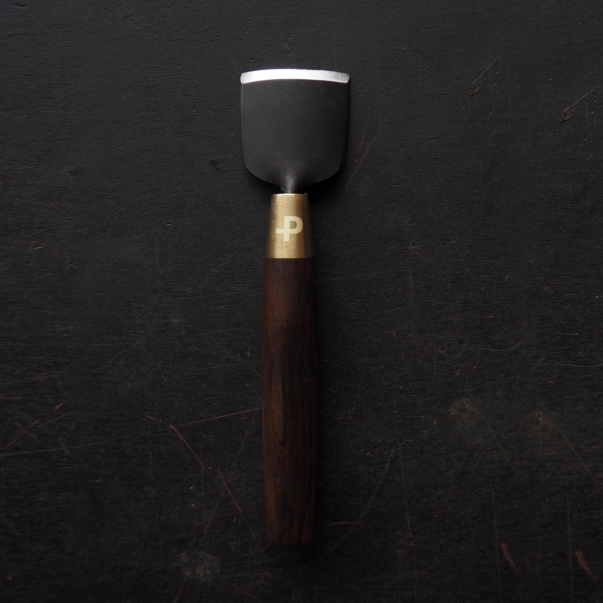 CPT Corner Punch Tool – Full Set featured tool with wooden handle and metal head.